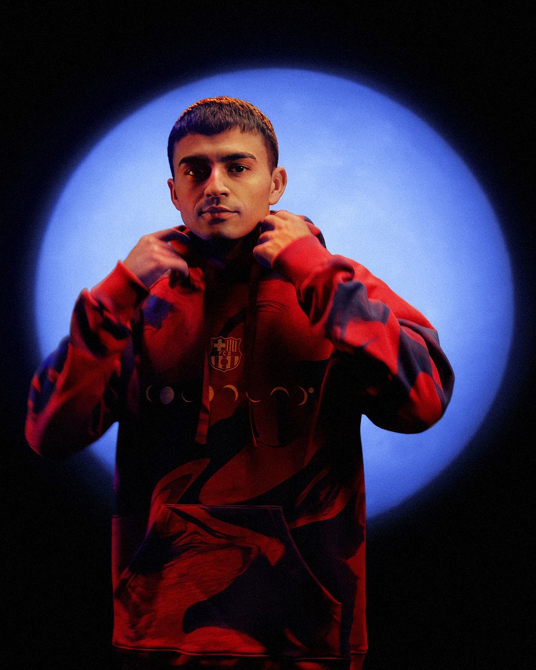 Coldplay versiert FC Barcelona voetbalshirt tijdens El Clásico