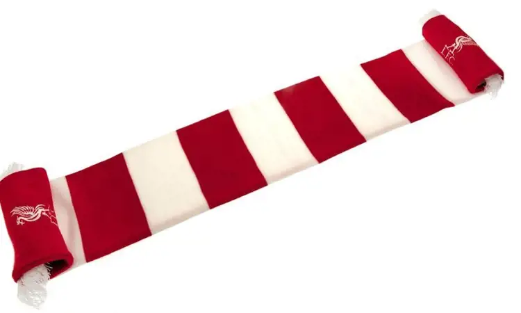 De Liverpool sjaal moet rood/wit zijn en DNA ademen