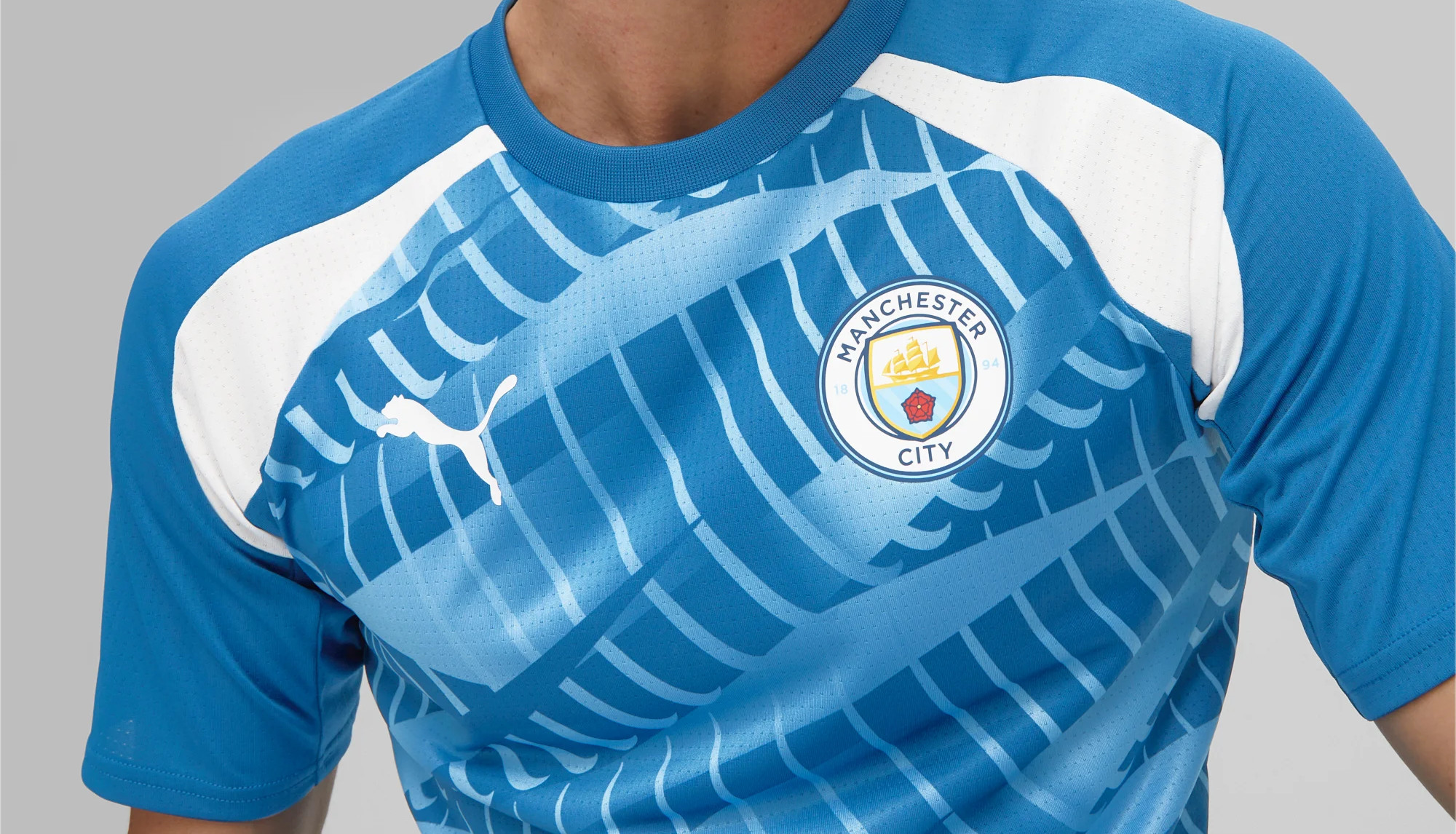 Dit warming-up shirt draagt Manchester City tijdens 2023-2024